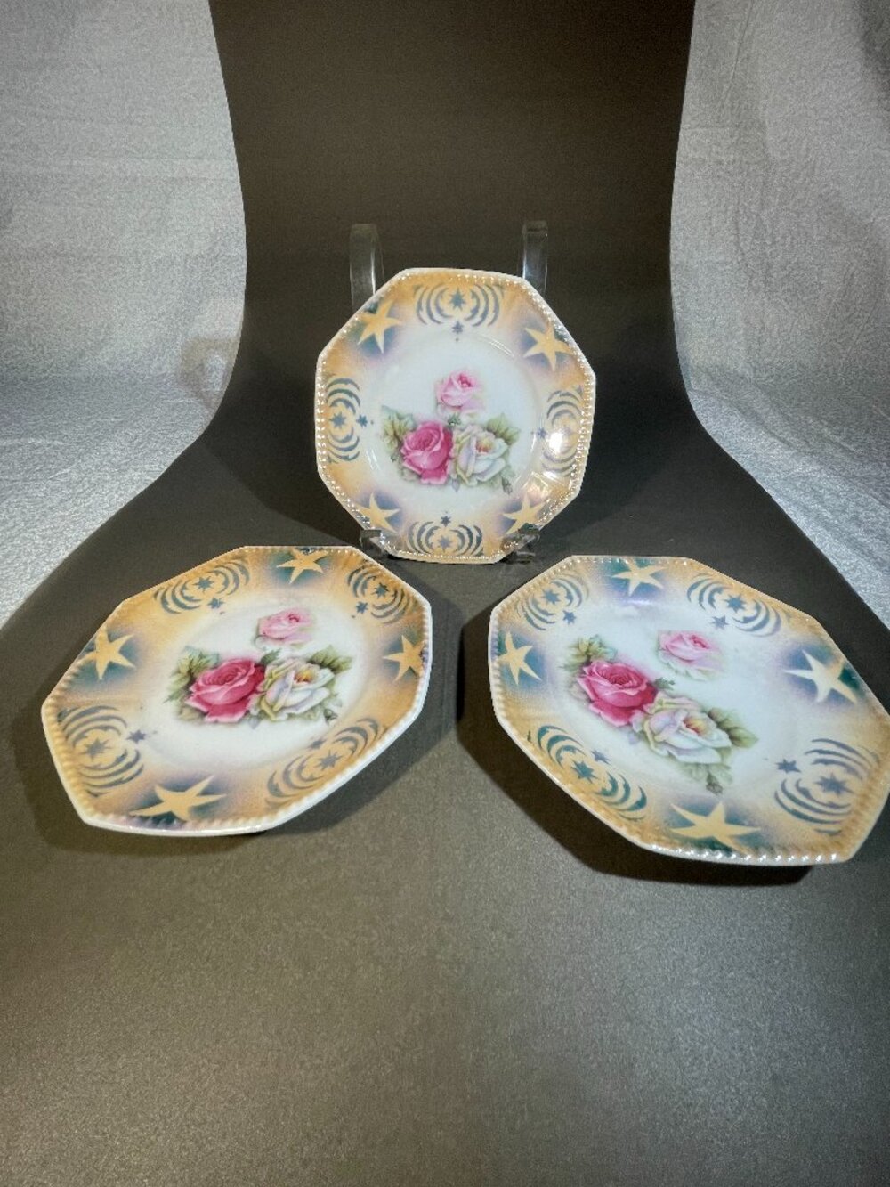 3 Otto Grunert 5" plates. Gold and blue edge with roses (#733)